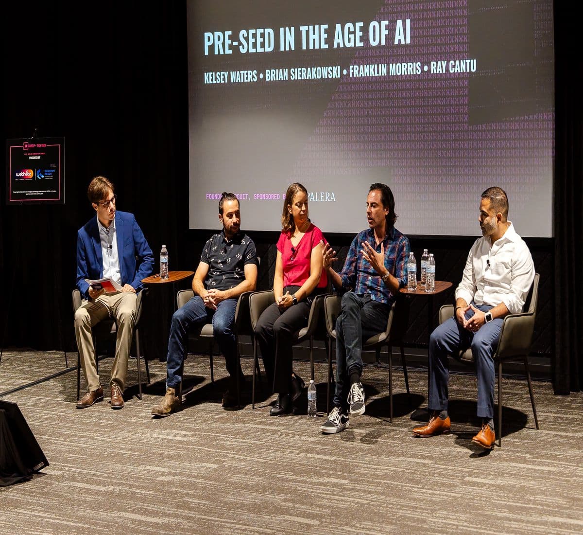 Five speakers on the main stage at Texas Public Radio under a screen reading Pre-Seed in the Age of AI